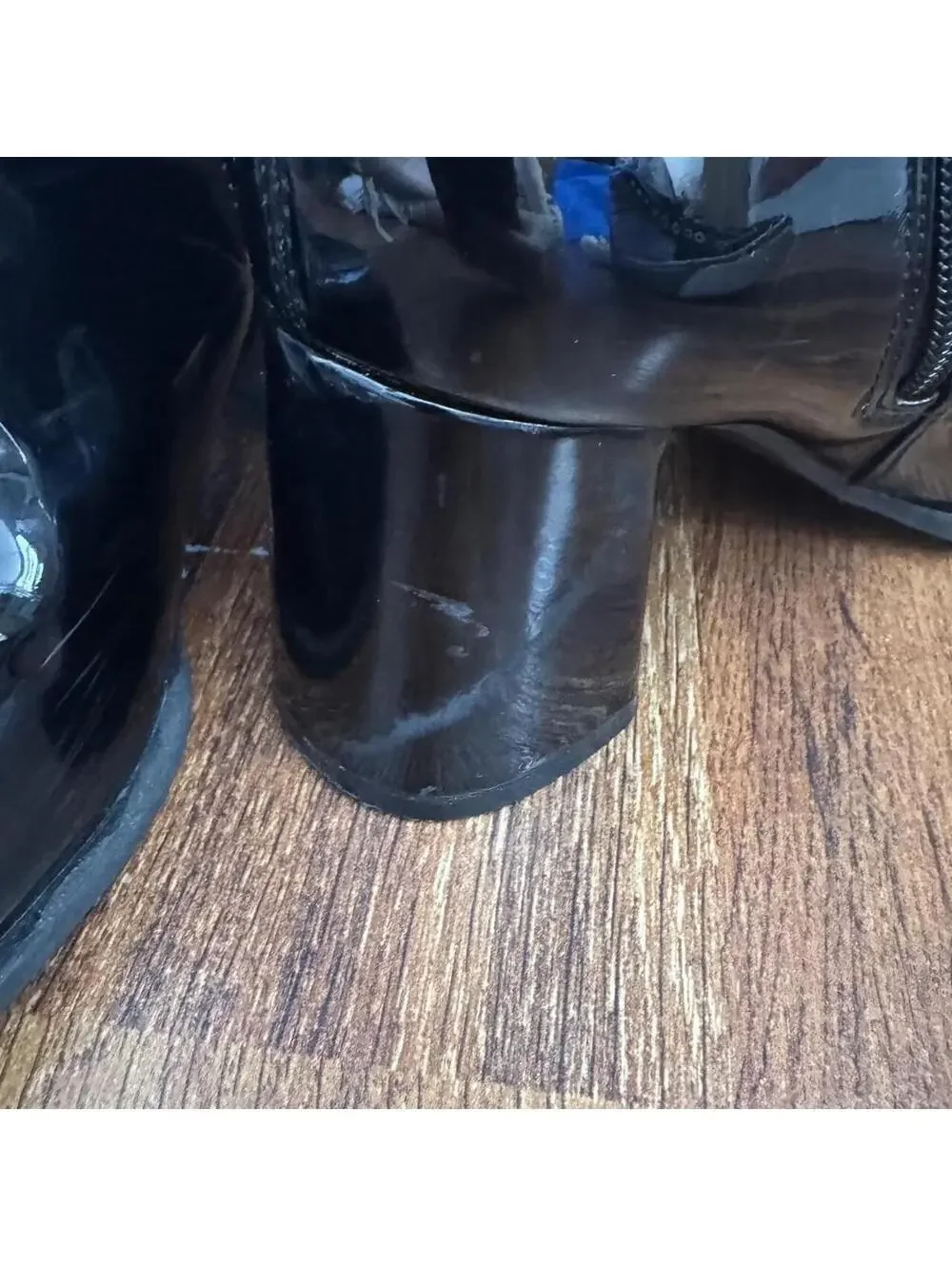 Black knee-high/go go boots with a 4” heel